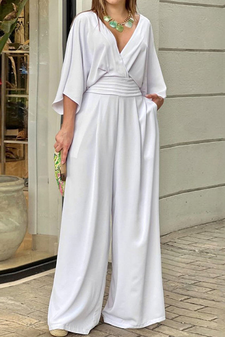 Elegante mono holgado con escote liso plisado en V Elena™