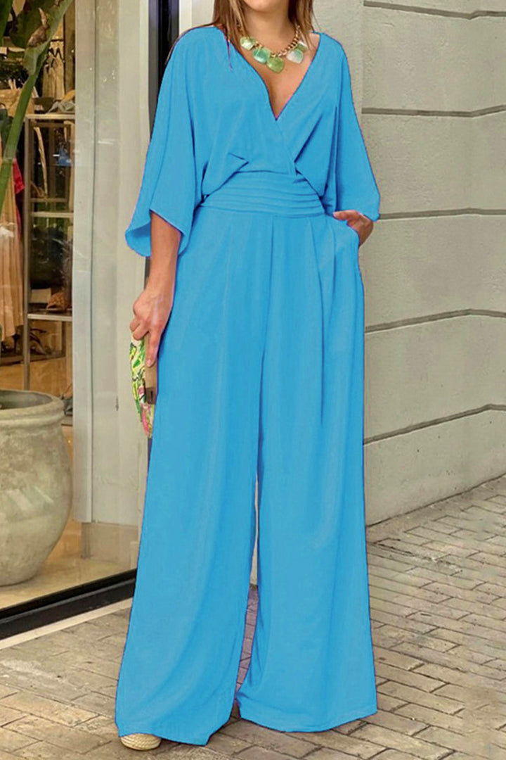 Elegante mono holgado con escote liso plisado en V Elena™