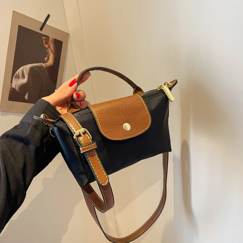 Elegante y versátil bolso de piel Vega™