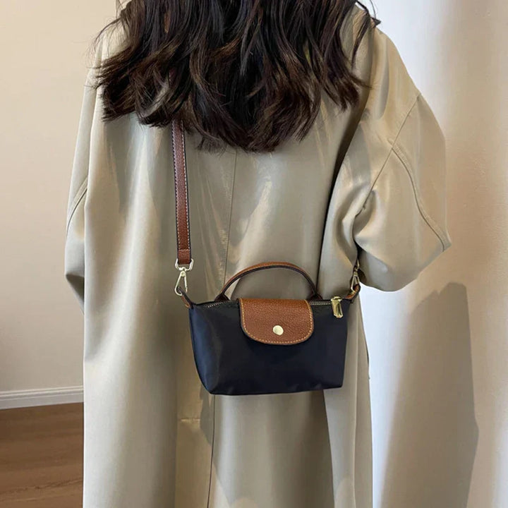 Elegante y versátil bolso de piel Vega™