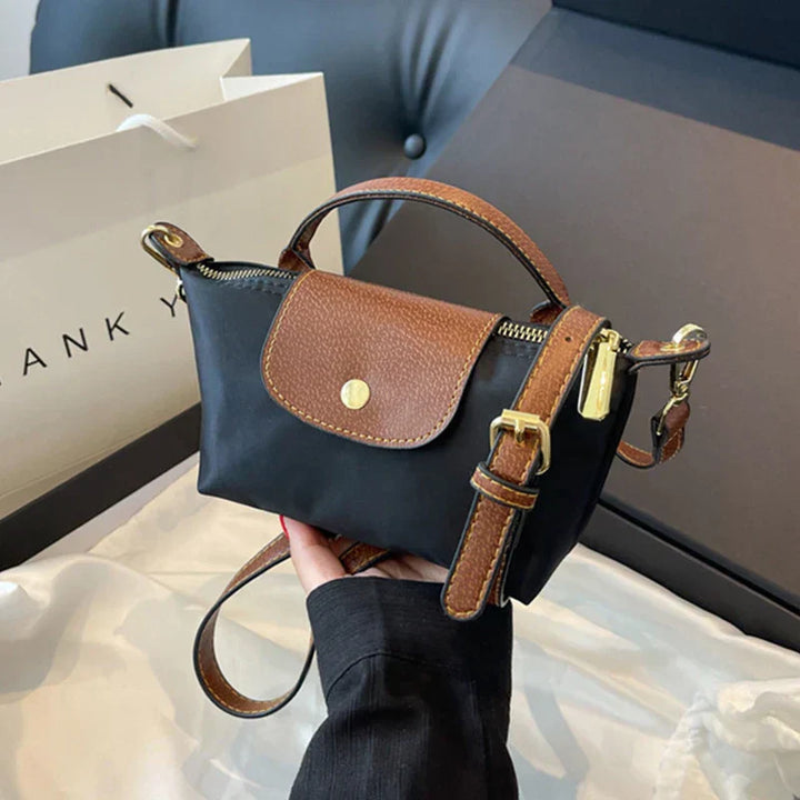 Elegante y versátil bolso de piel Vega™