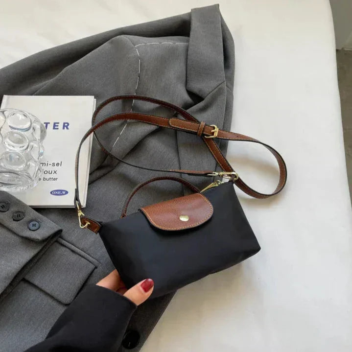 Elegante y versátil bolso de piel Vega™