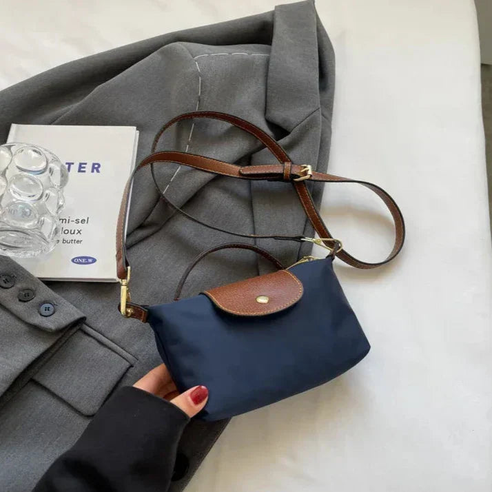 Elegante y versátil bolso de piel Vega™
