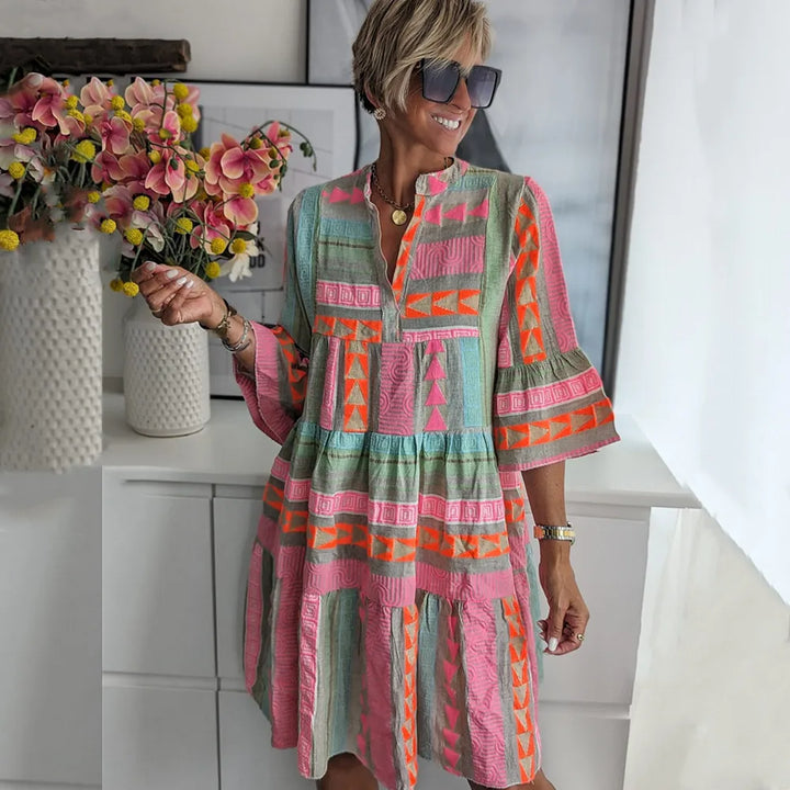Vestido escalonado con vuelo Nora™