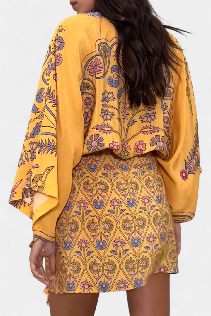 Vestido Candela Boho con Estampado Floral y Escote en V Cruzado